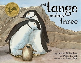 3 penguins cuddling on the cover of and tango makes three