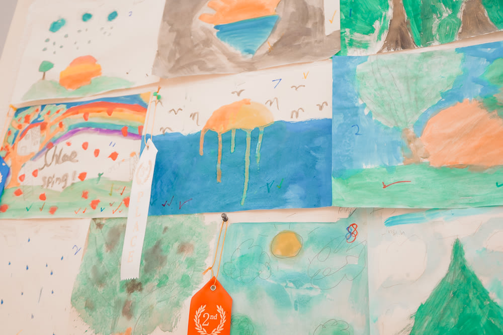 A wall in Jenny's classroom displays watercolour artwork created by the children.