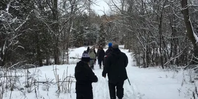 a group hiking in the winter snow