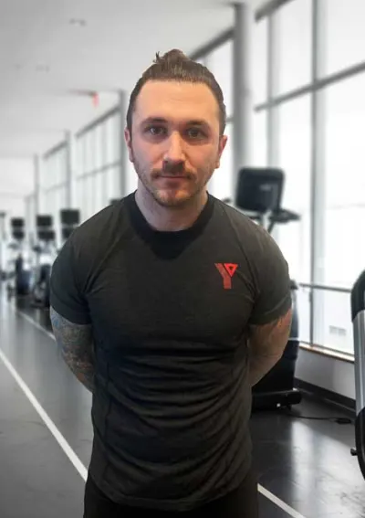 kyle standing in the gym