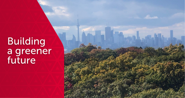 Text: Building a greener future. Photo: The Toronto skyline in the background and a canopy of green trees in the foreground.